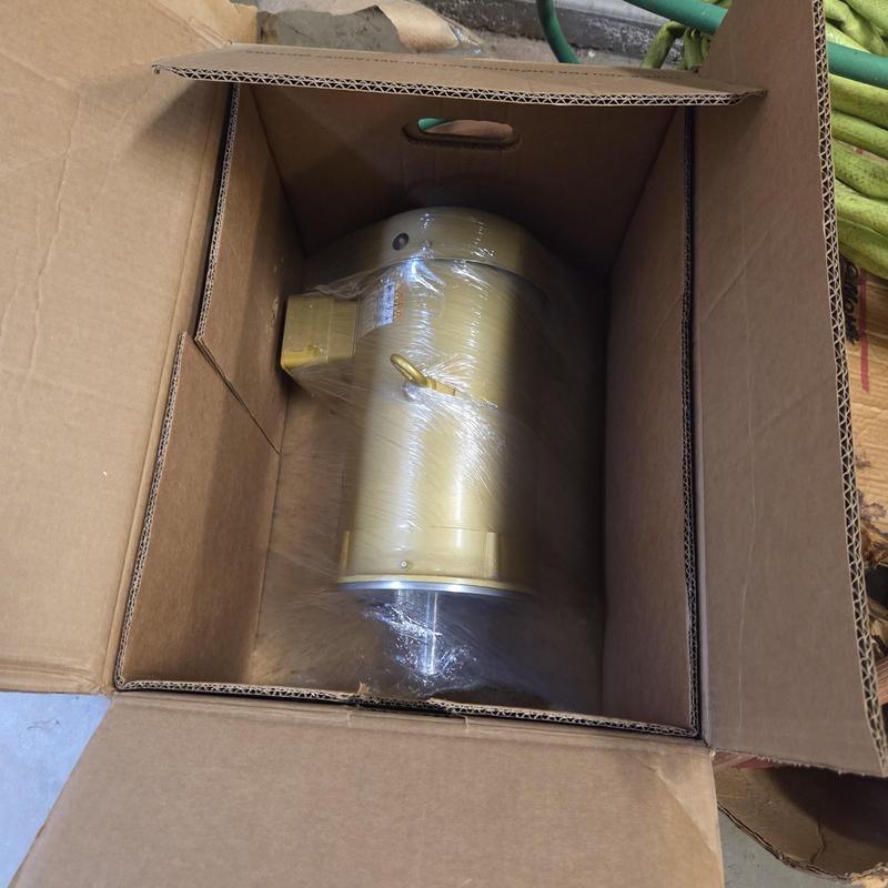 Cooling tower pump motor wrapped in box