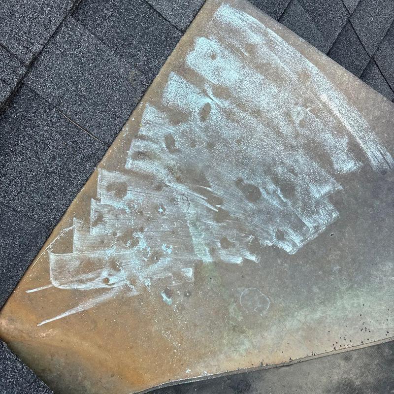 Roof shingles with hail damage and seal wear