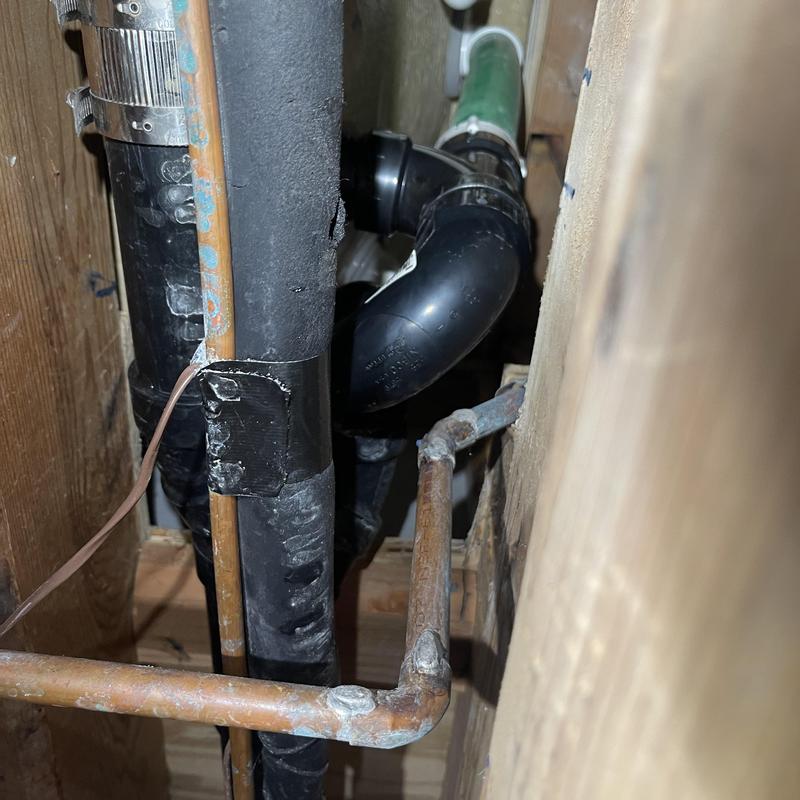 Jetted tub waste and overflow drain pipes installation