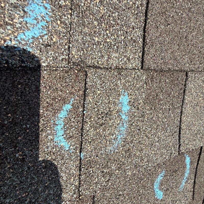Architectural shingles with hail damage markings