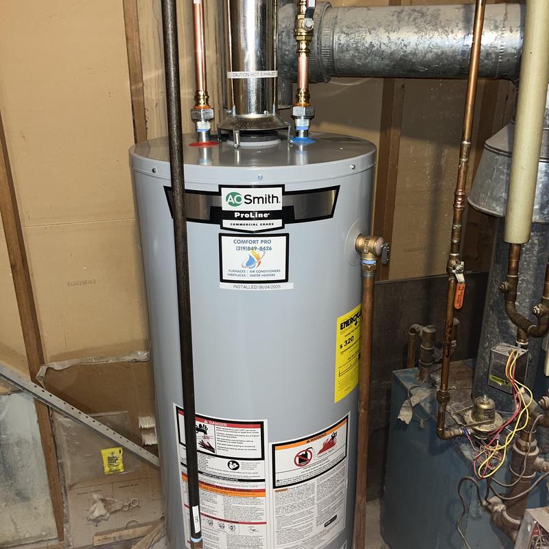Water heater installation with copper piping in basement