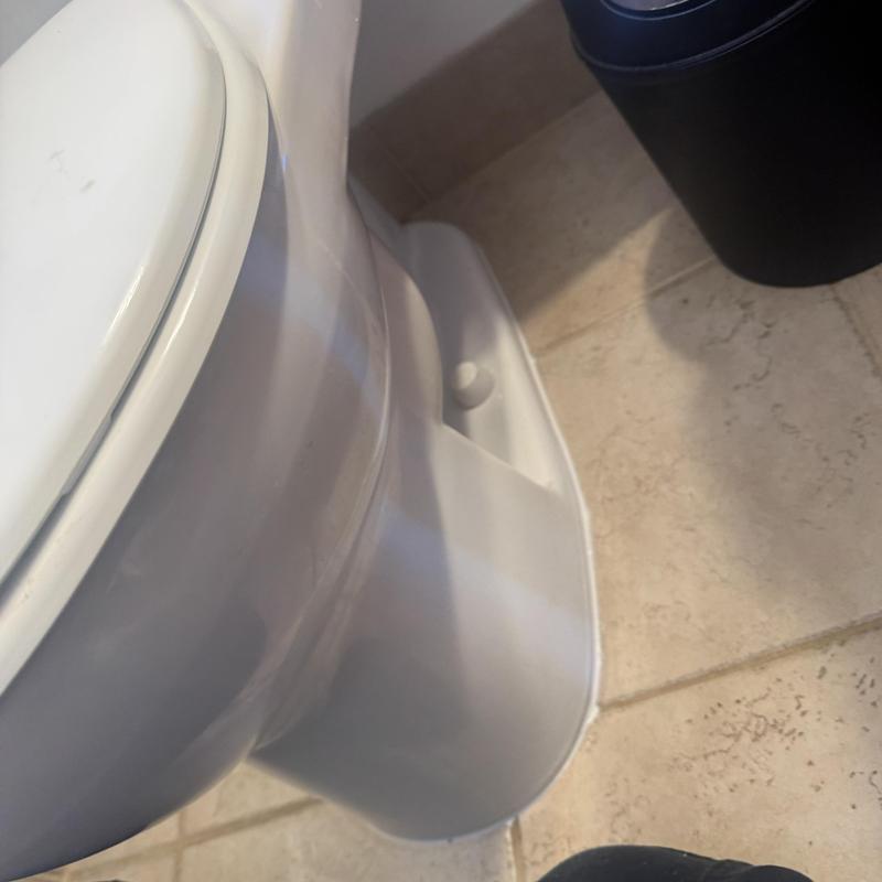 Toilet base with new caulking and wax ring seal