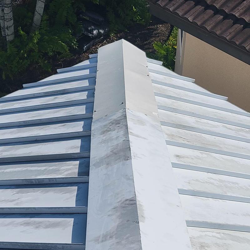 Standing seam metal roof ridge and panels view