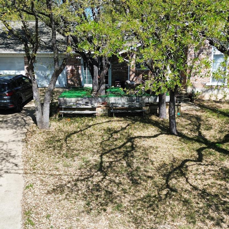 Roof with new GAF shingles and ridge vent under trees Roof with new GAF shingles and ridge vent under trees