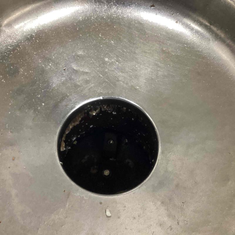 Kitchen sink drain hole with missing strainer basket
