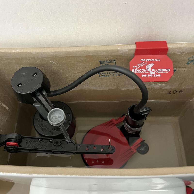 Toilet fill valve and flapper replacement in tank