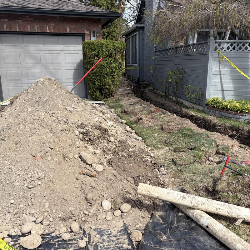 1-inch water main installation with excavation in yard 1-inch water main installation with excavation in yard