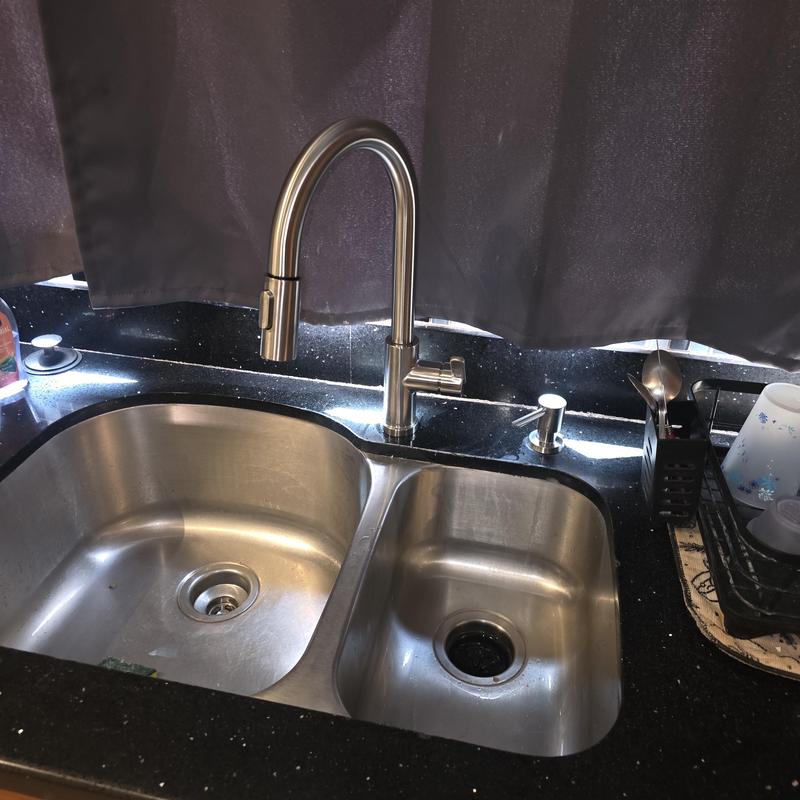 Kitchen faucet with dual stainless steel sinks installed Kitchen faucet with dual stainless steel sinks installed