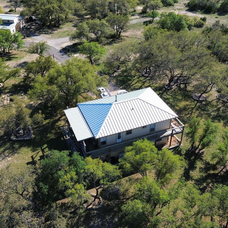 Standing seam galvalume metal roof on rural home Standing seam galvalume metal roof on rural home