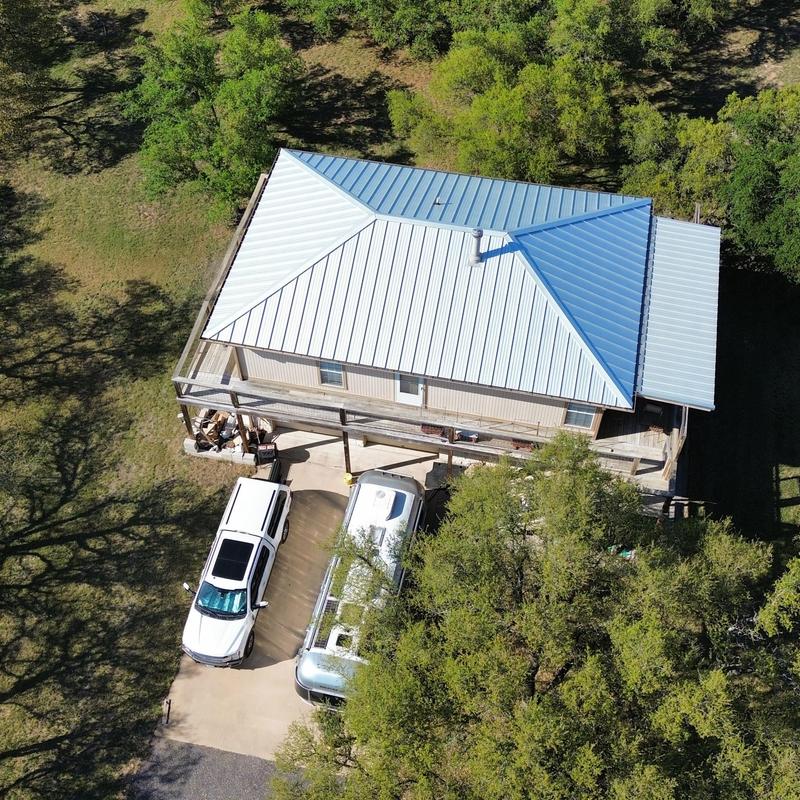 Standing seam galvalume metal roof on house Standing seam galvalume metal roof on house