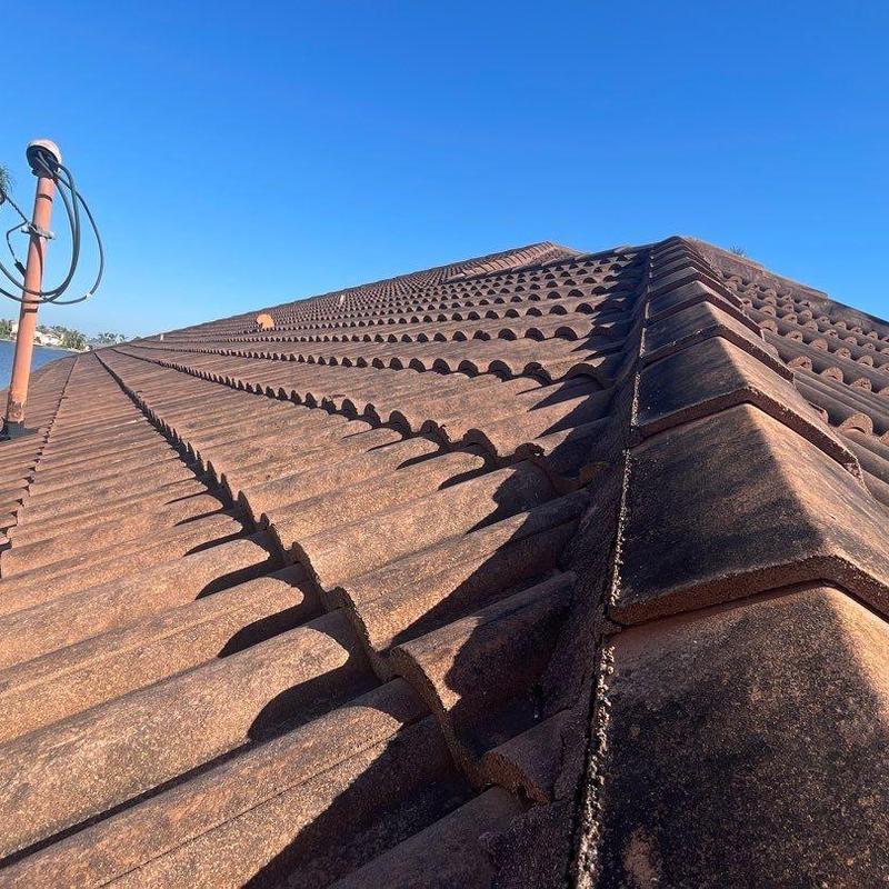 Concrete tile roof with mortar failure and aging underlayment