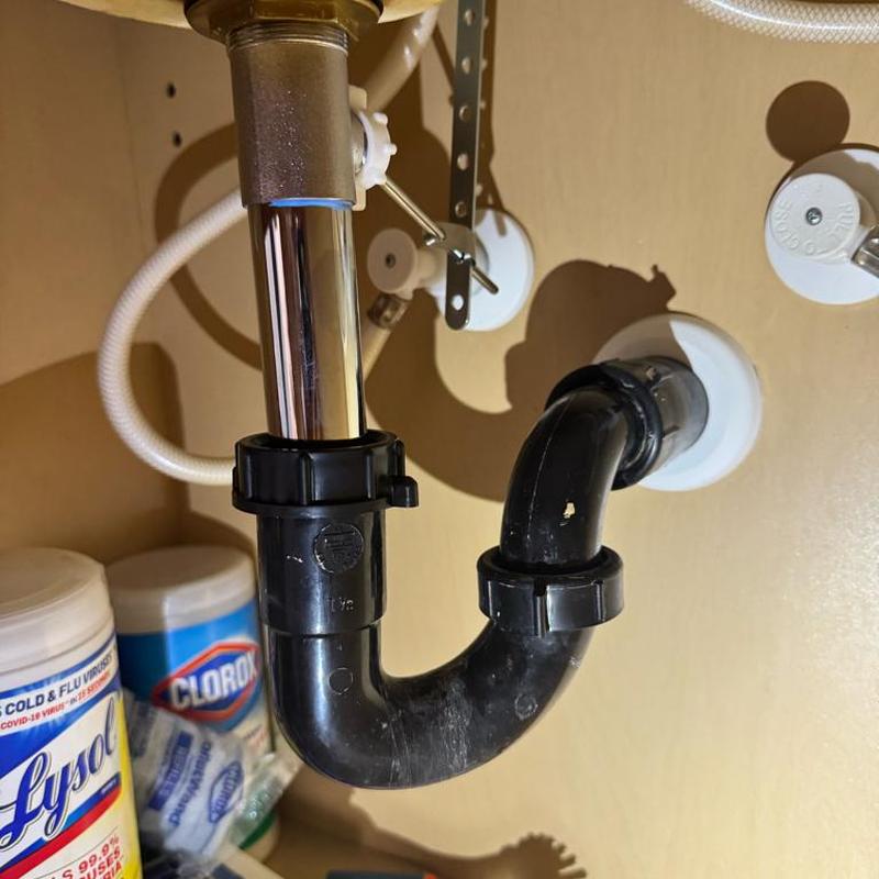 Pop-up drain assembly and P-trap under bathroom sink Pop-up drain assembly and P-trap under bathroom sink