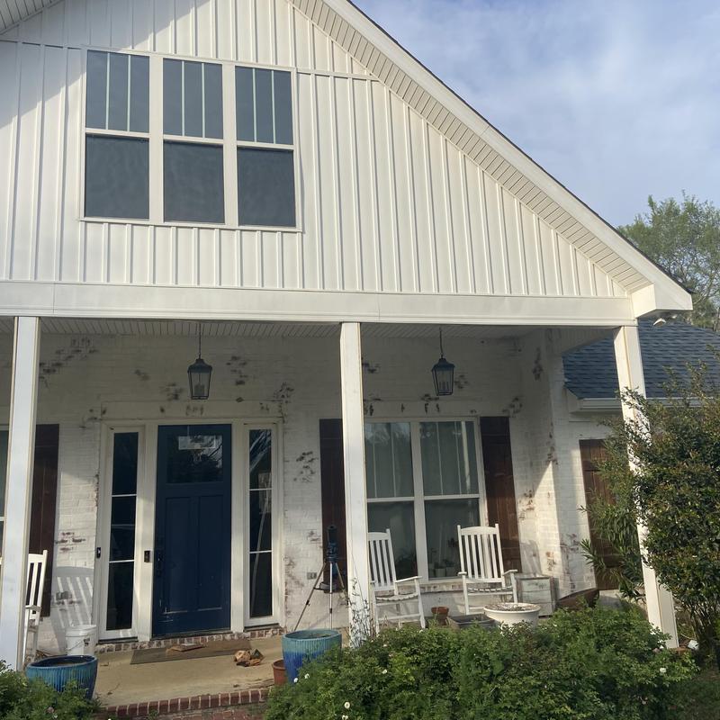 Front porch wrapped posts with new boards replacement