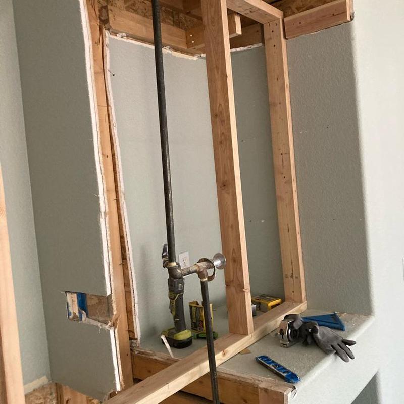 Gas line removal in living room wall framing