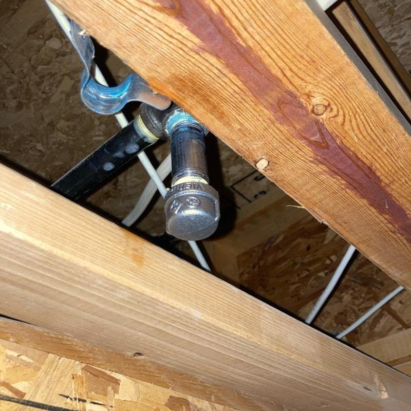 Gas line capped in living room ceiling joists
