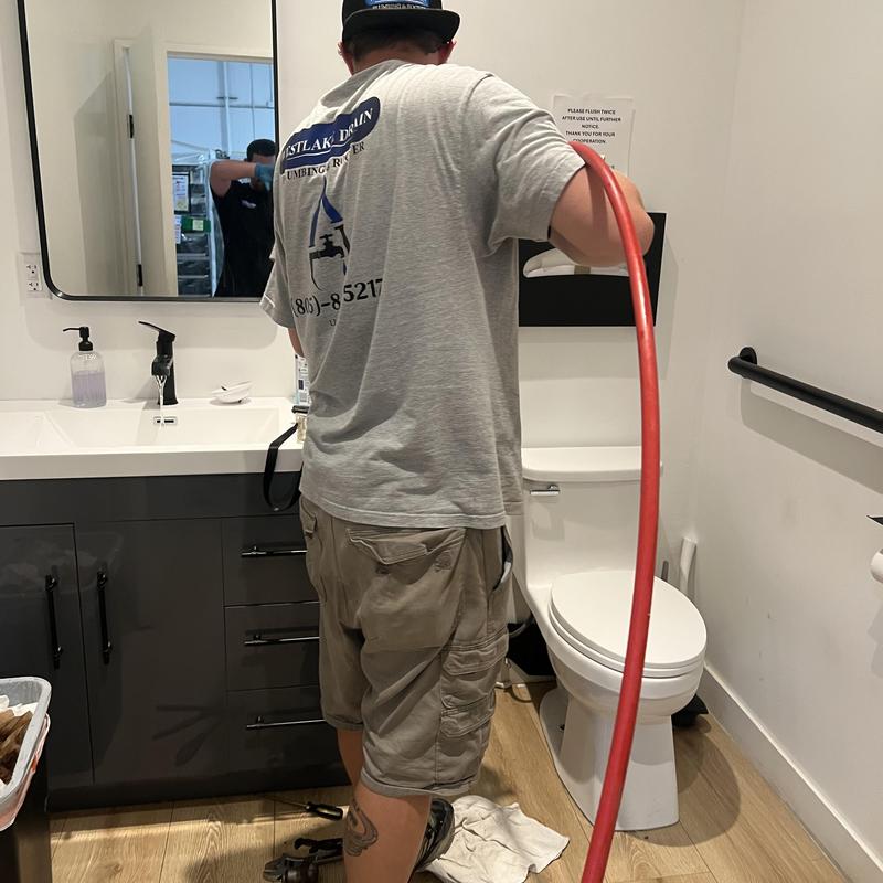 Toilet plumbing line hydro jet cleaning and inspection