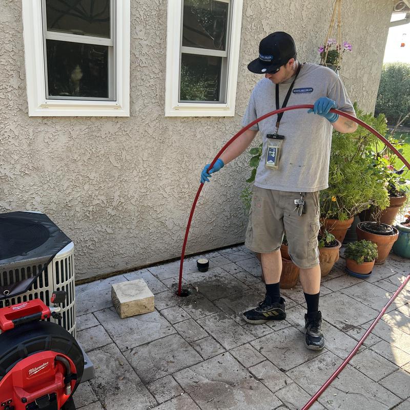 Sewer line hydro jetting and camera inspection outdoors