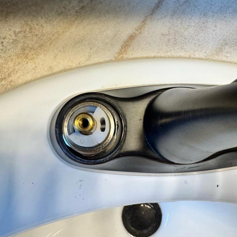 Bathroom faucet handle with cartridge removed Bathroom faucet handle with cartridge removed