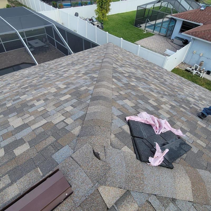 Hip cap shingles on shingle roof with repair materials