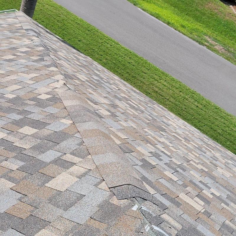 Hip cap shingles on asphalt shingle roof replacement