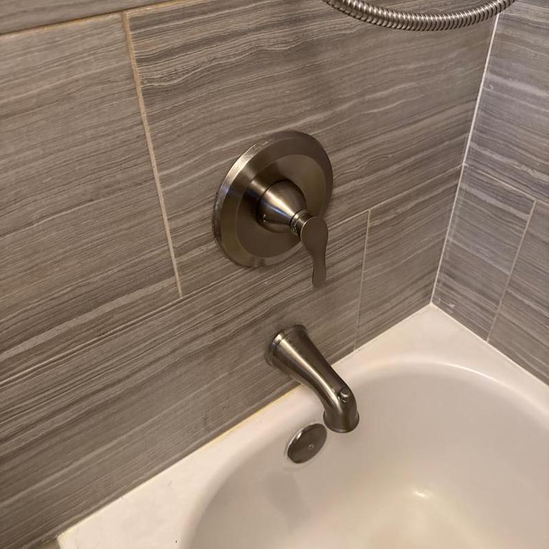 Shower faucet and tub spout installation in bathroom