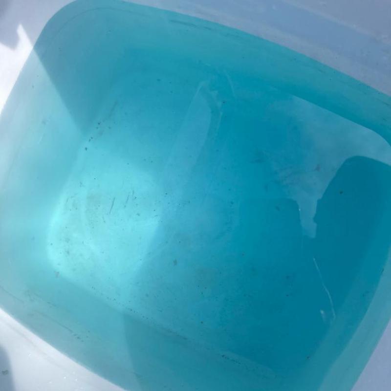 Tankless hot water heater flush water with sediment