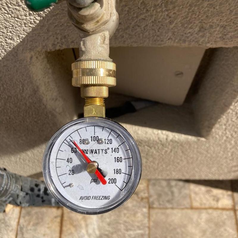 Pressure regulating valve gauge showing 70 psi in San Tan Valley