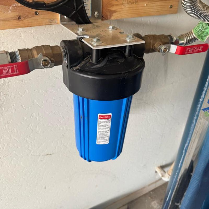Whole house water filtration unit with new housing