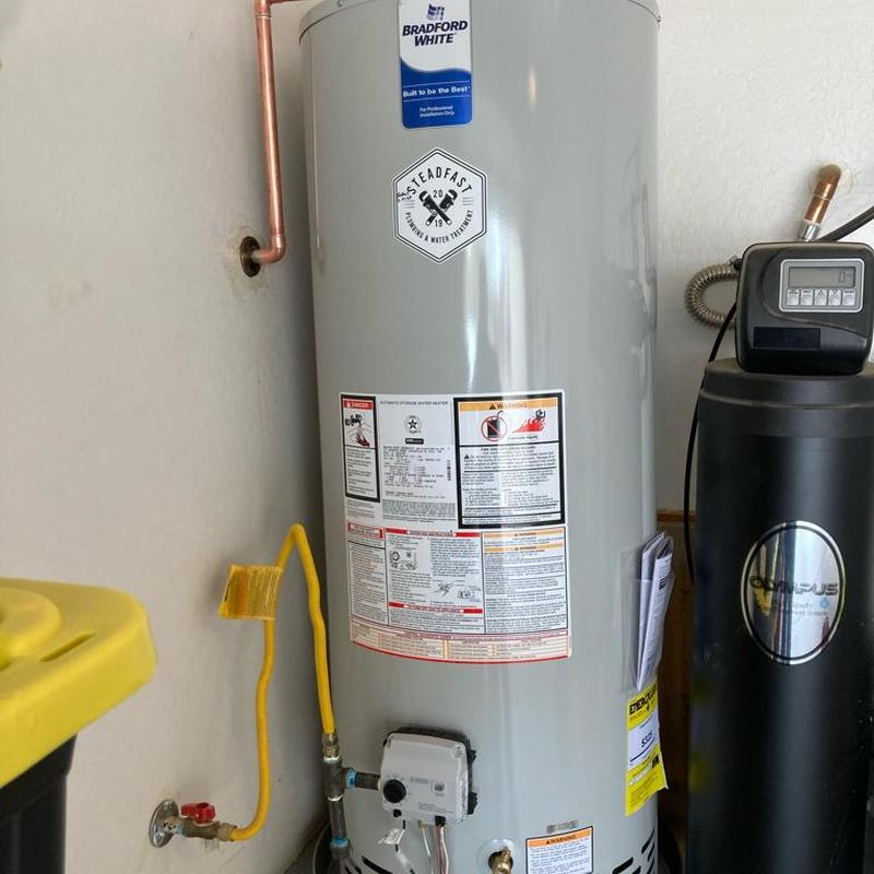 Bradford White gas water heater installation with leak pan