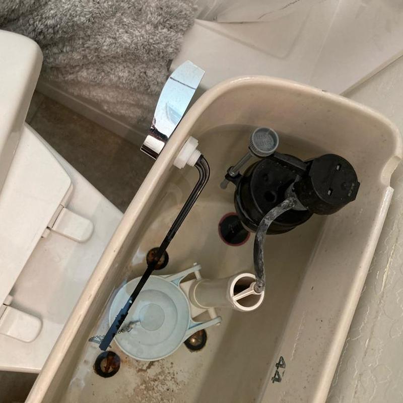 Toilet tank with replaced chrome handle in Gilbert, AZ Toilet tank with replaced chrome handle in Gilbert, AZ