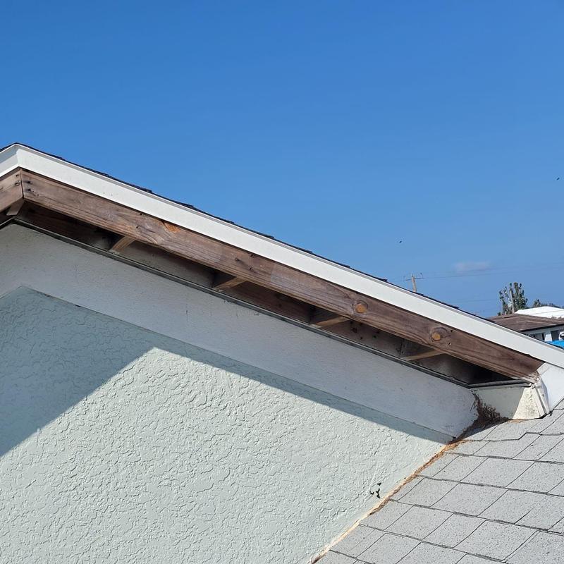 Soffit section with wood frame on residential roof