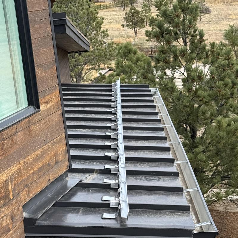 S-5 SnoStop snow fence installed on metal roof S-5 SnoStop snow fence installed on metal roof