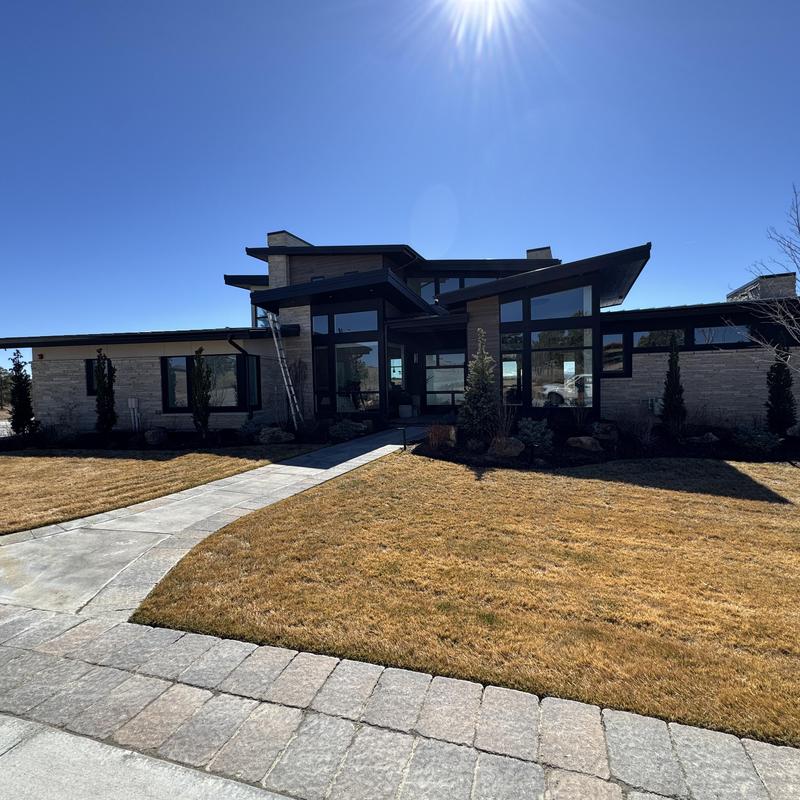 S-5 SnoStop snow fence installation on house roof S-5 SnoStop snow fence installation on house roof