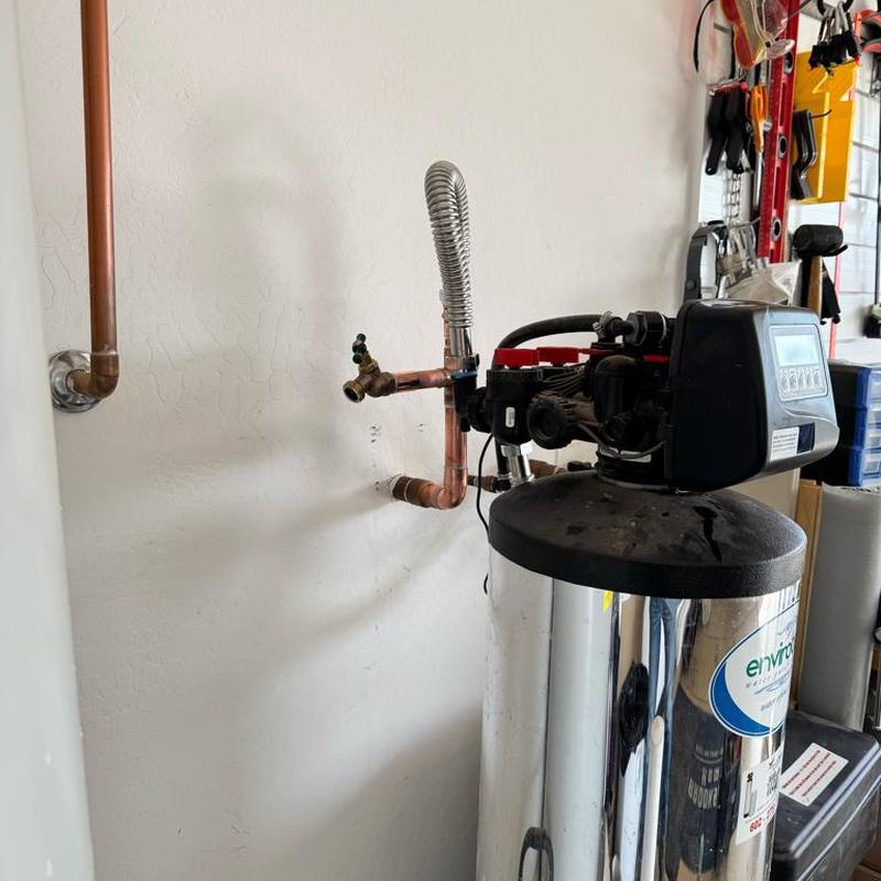 Water softener hose bib and copper piping installation