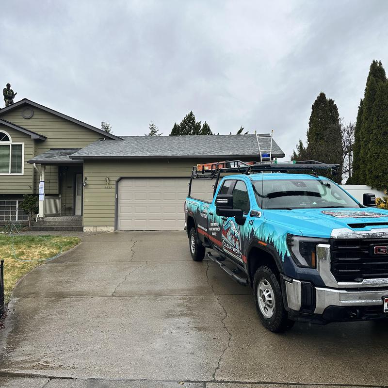 New shingle roof blending with older roof panels