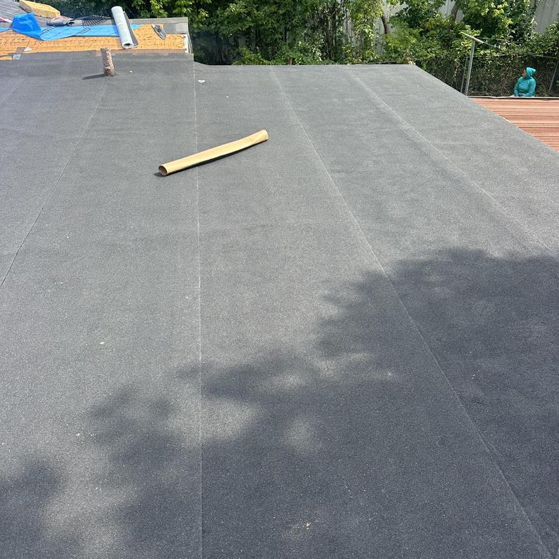 Flat roof black membrane installation in Fort Worth