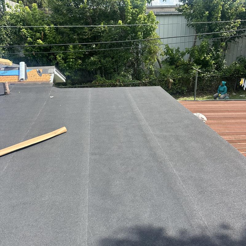 Flat black roof membrane installation in Fort Worth