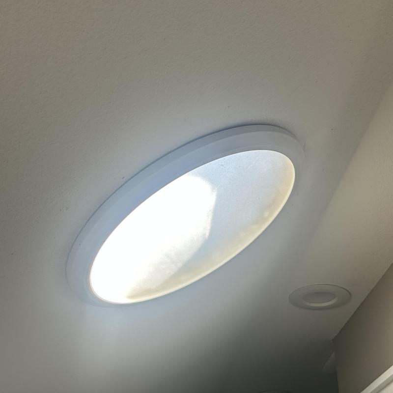 Solar tube ceiling light diffuser in Fairmont home