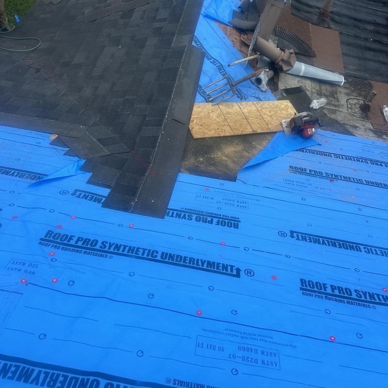 Synthetic roof underlayment installation on decking panel