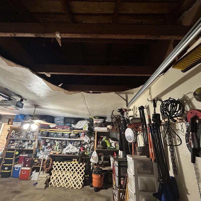 Sheetrock ceiling collapse from water leak in garage