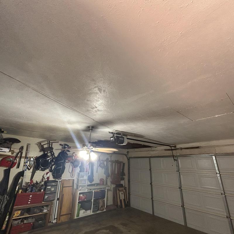 Sheetrock ceiling damage from water leak in garage