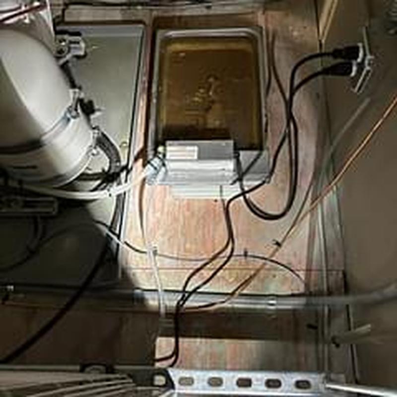 Humidor drain pan with wiring and pipes installation