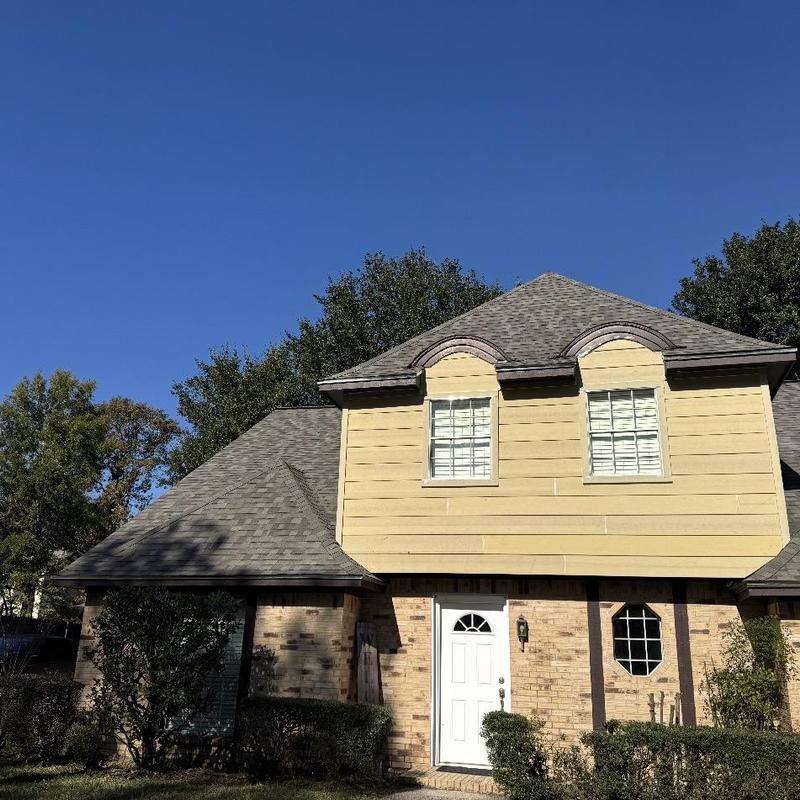 Residential asphalt shingle roof with dormer windows