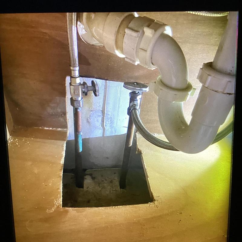 12 copper water lines with shutoff valves below sink
