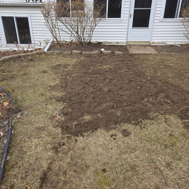 Outside sewer line excavation and pipe replacement site