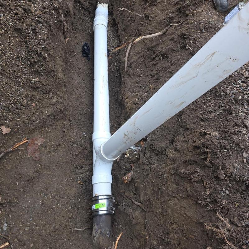 4-inch PVC sewer pipe with cleanout installation