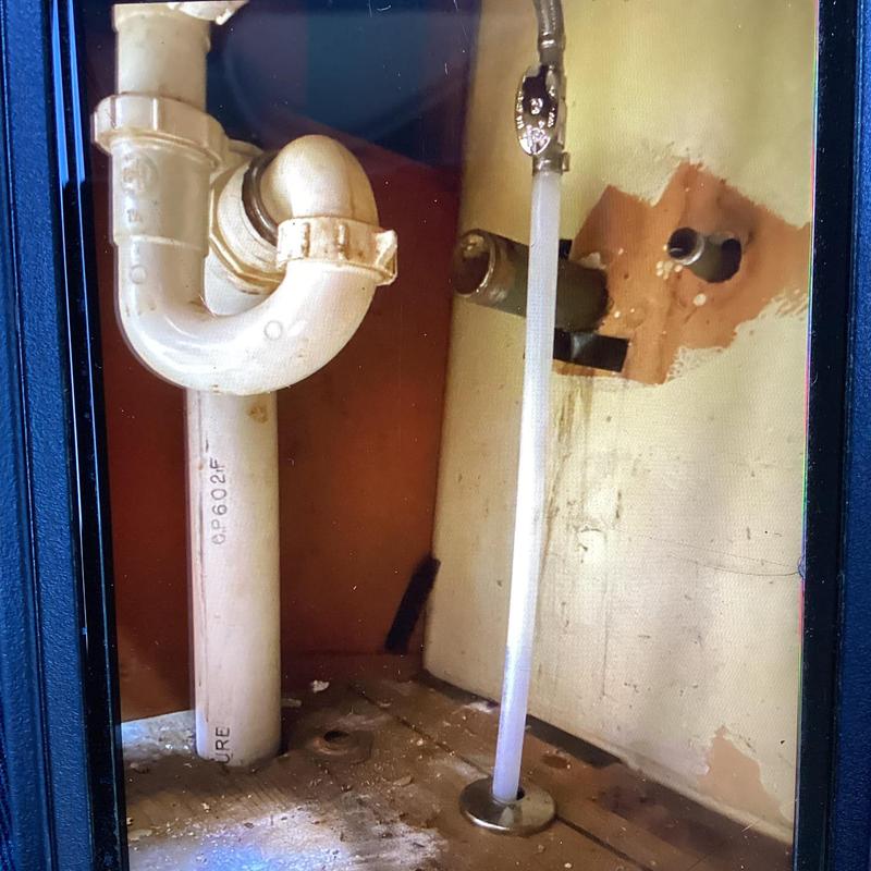 Kitchen sink drain and hot waterline installation