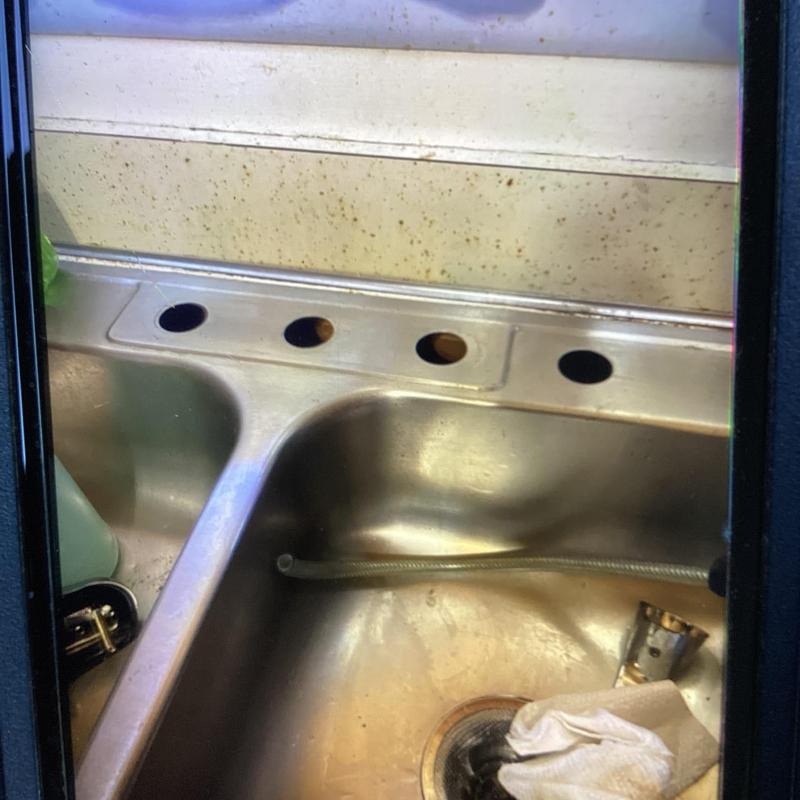 Kitchen sink holes for faucet and handles installation