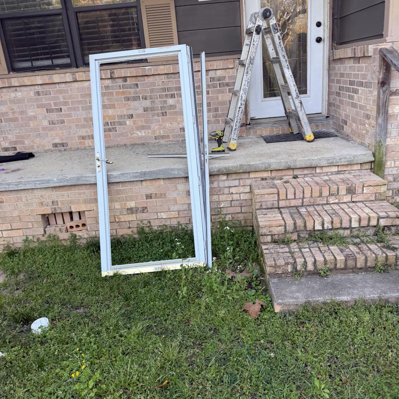 Storm door frame removed from front porch area Storm door frame removed from front porch area