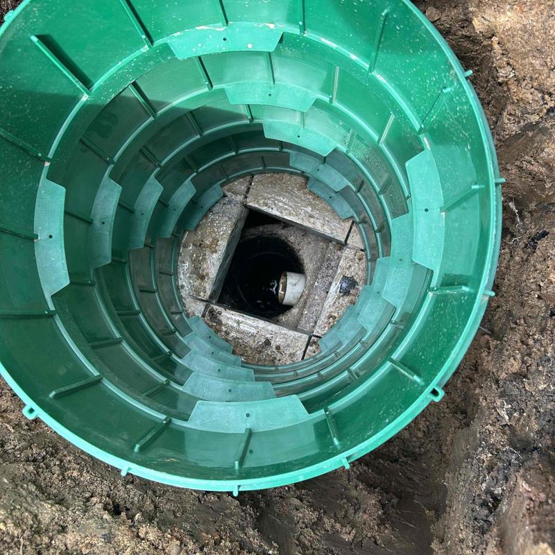 Septic tank with new green riser installation